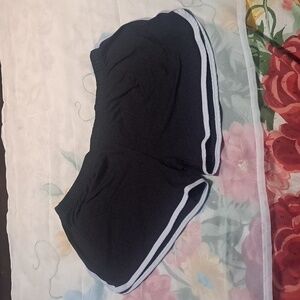 Short stretchy shorts,black with white trim, size: Jr. Large